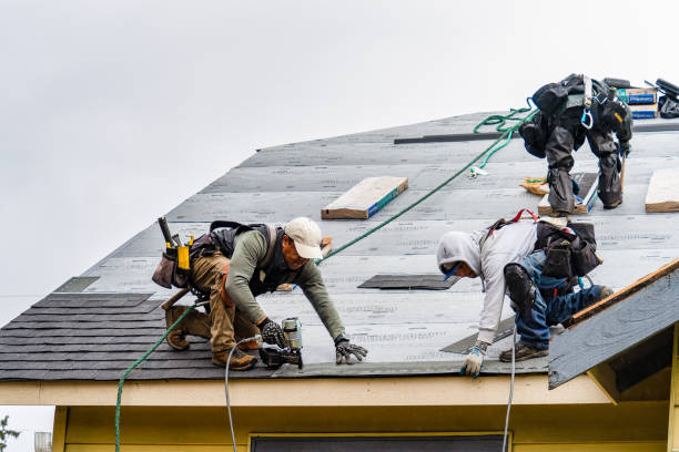 Professional Gutter Installation technician working in Garrison, ND